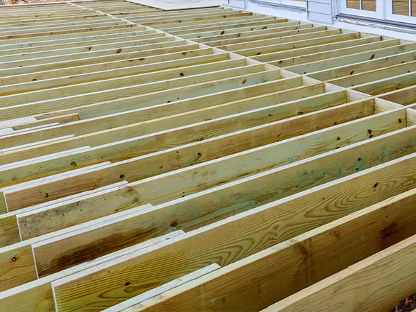 A pressure treated wood deck frame