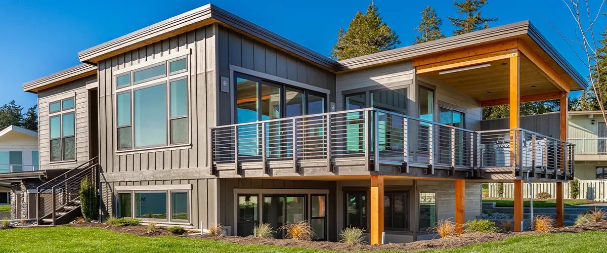 An expensive looking home with steel railing