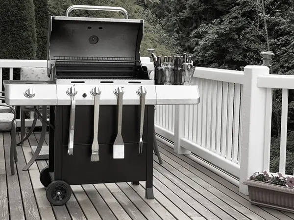A grill on a deck