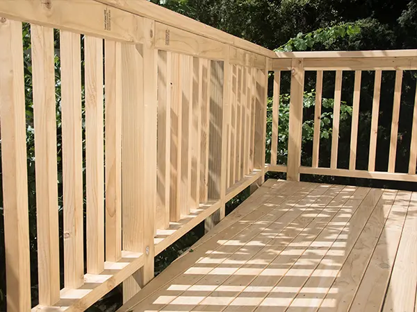 Wood railing on wood deck