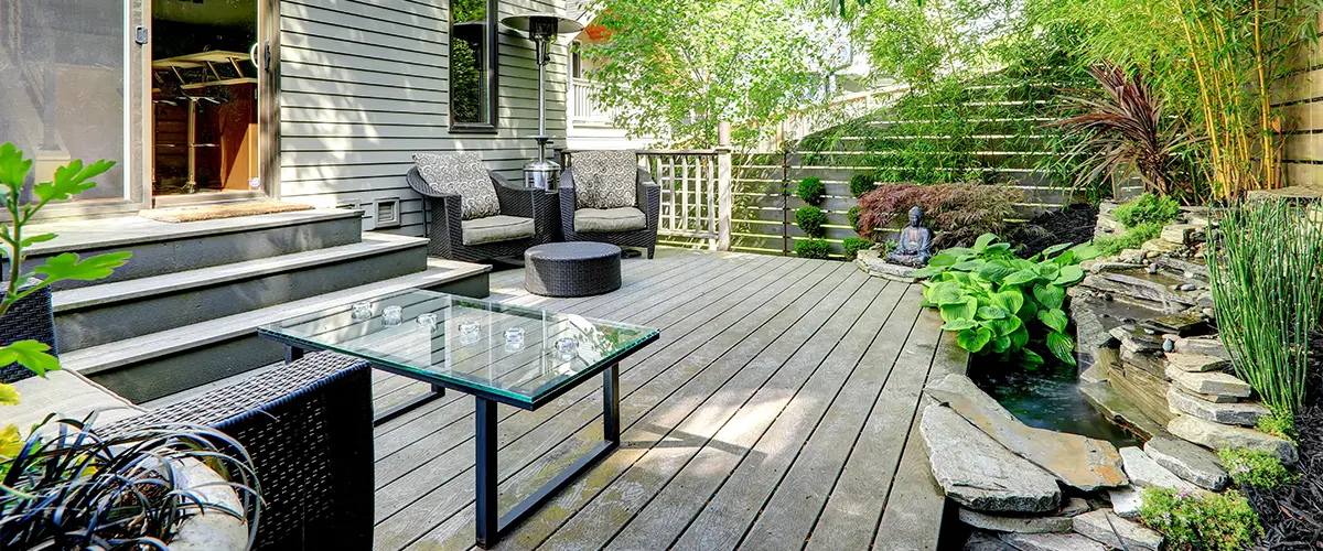 Gray wood decking with outdoor furniture
