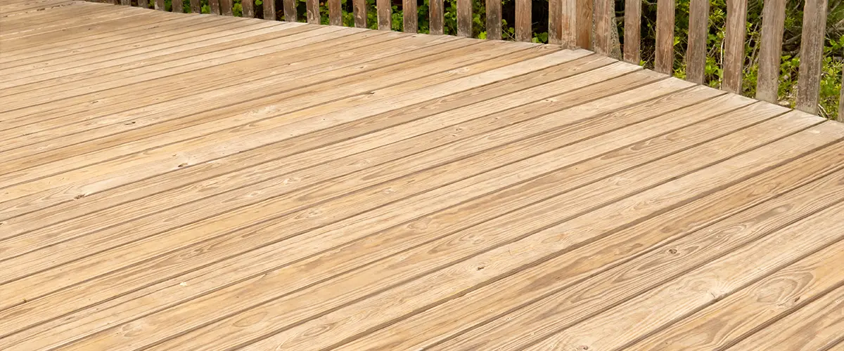 Pressure treated deck with wood railings