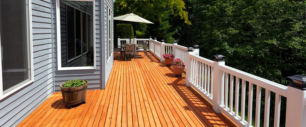 Cedar decking with white aluminum railing
