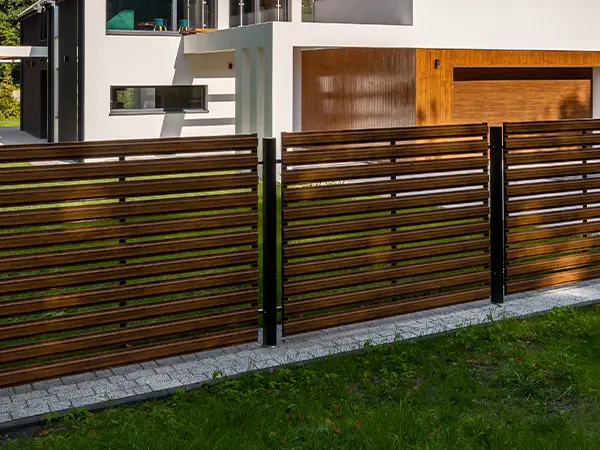 Composite fencing with metal posts
