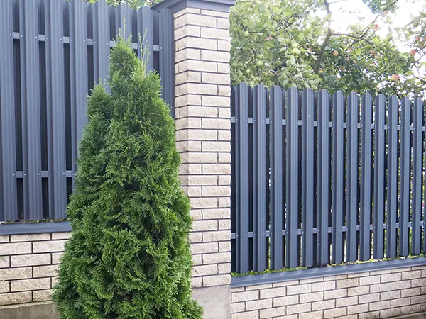 Masonry and metal fence combination