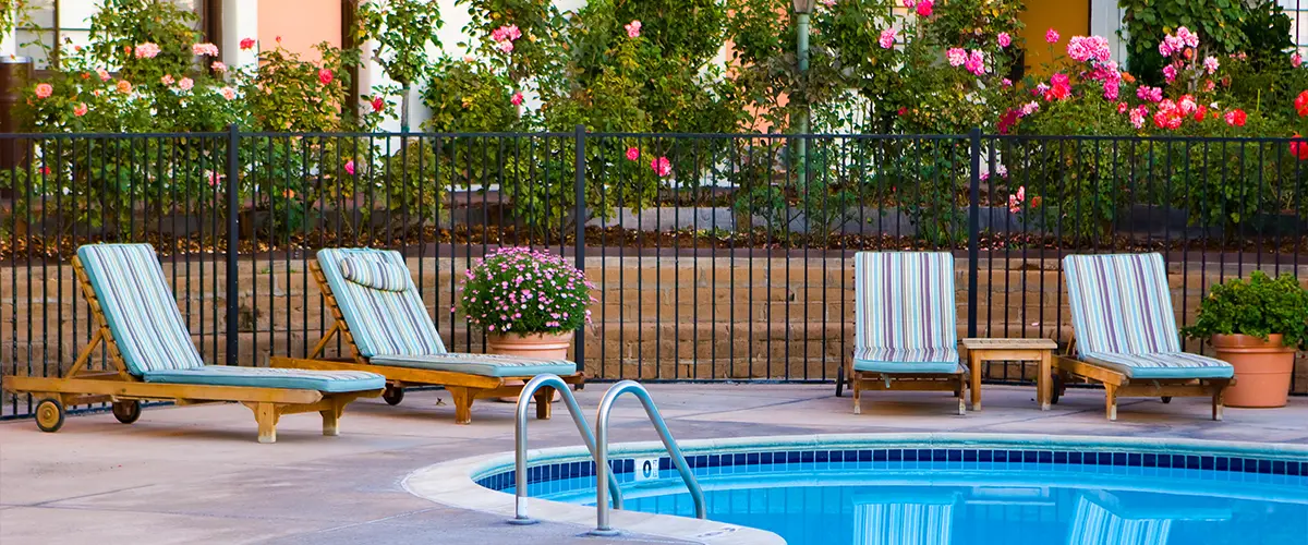 Metal fencing around a pool