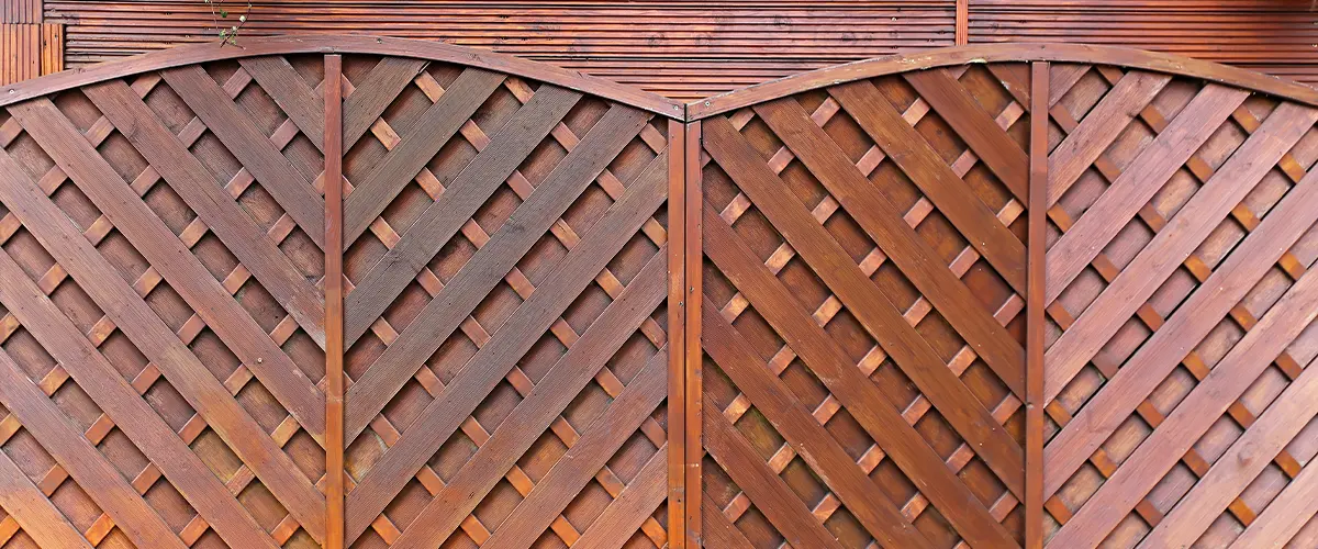 A privacy fence made of wood