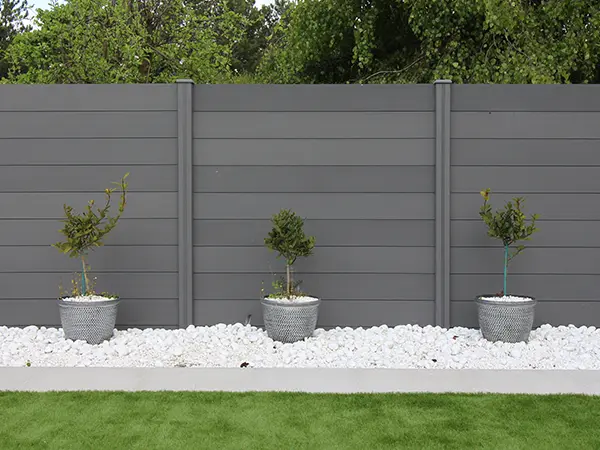 PVC fencing with potted plants