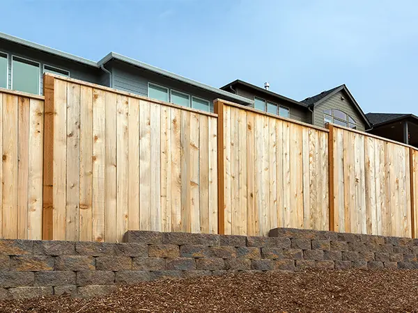 privacy cedar fence on a slope