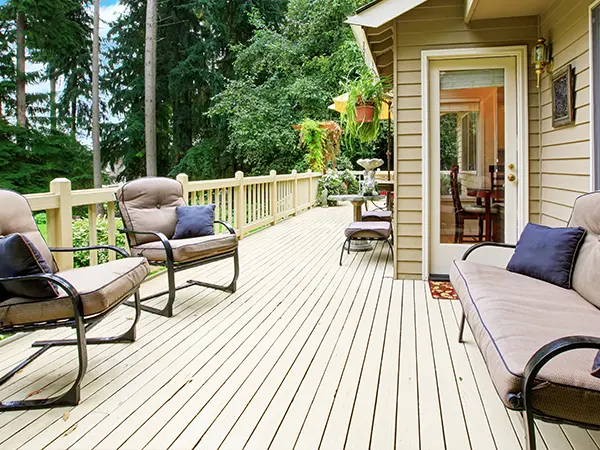 Beige wood decking with outdoor furniture