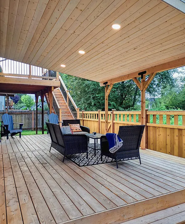 deck refinishing in Snohomish with a roof and integrated lights