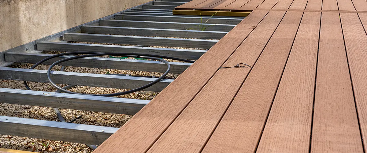 Composite decking with metal frame
