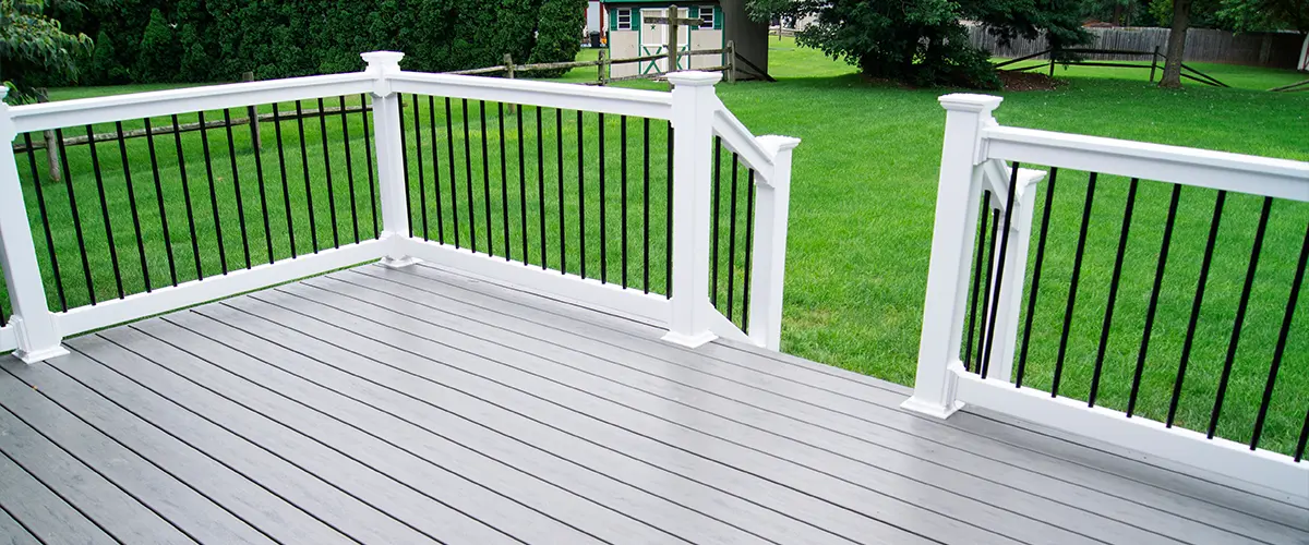 Metal railing on composite deck