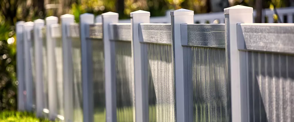 white vinyl fencing in garden